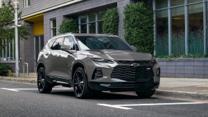 A 2022 Chevrolet Blazer riding down a road