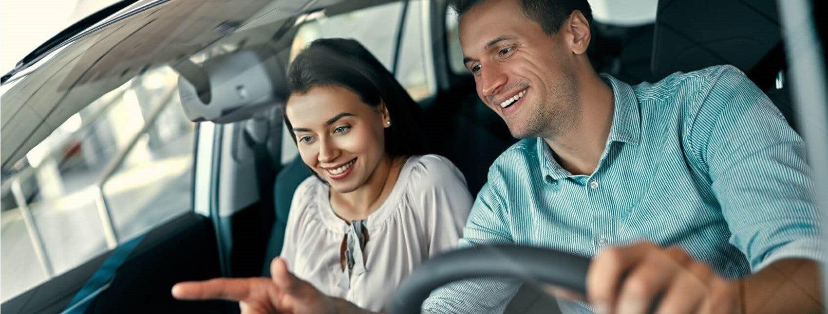 Couple Sitting in Car Snipped